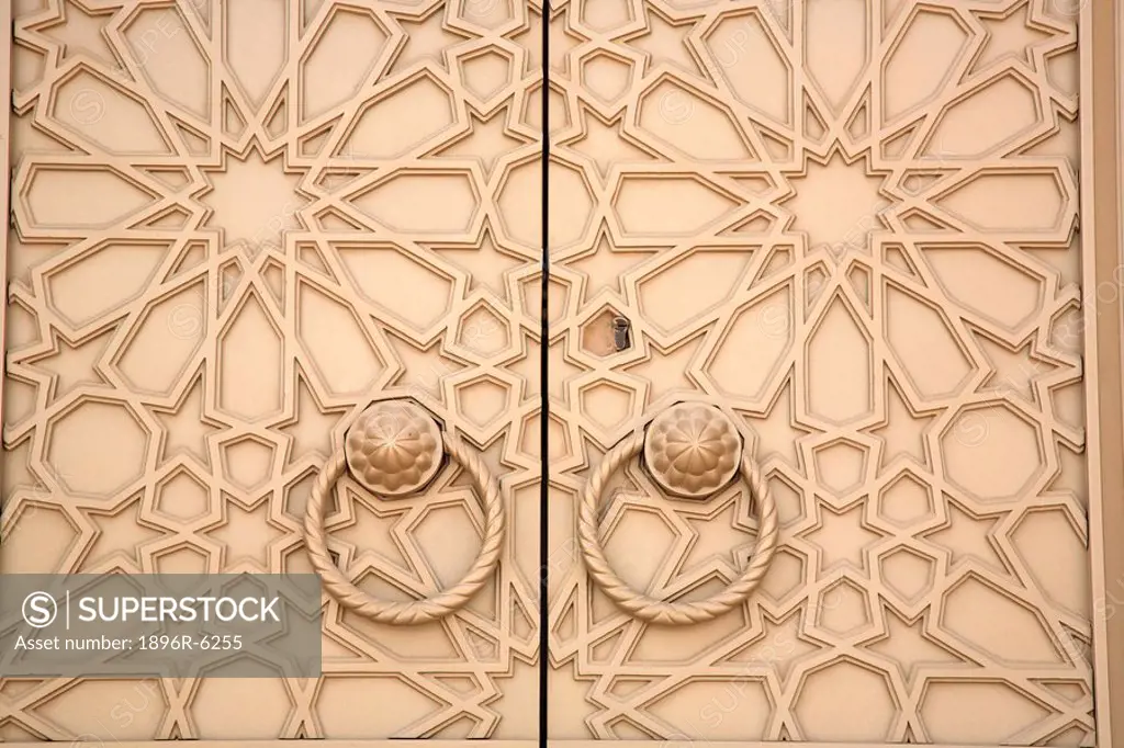 Doorway with intricate geometrical Arabic patterns. Dubai, United Arab Emirates