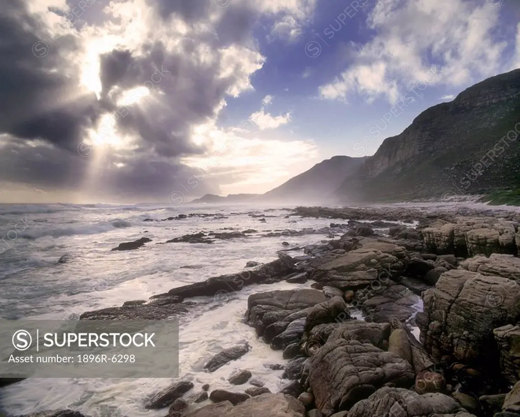 Sunset over the Atlantic Ocean near Scarborough. Misty Cliffs, Scarborough, Western Cape Province, South Africa