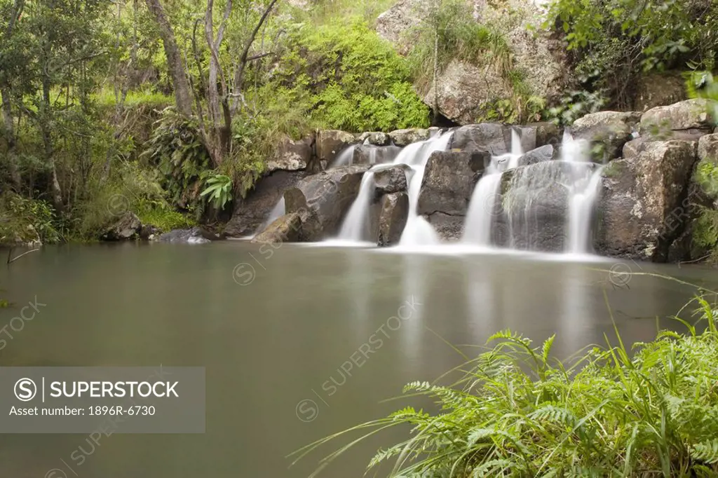 Fairy falls at the foot of the Amphitheatre in the Royal Natal National Park, Drakensberg, KwaZulu_Natal Province, South Africa