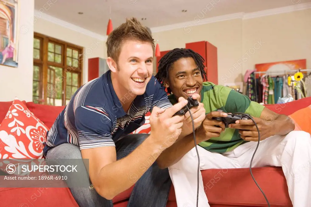 South African teen culture _ Young men playing TV games.