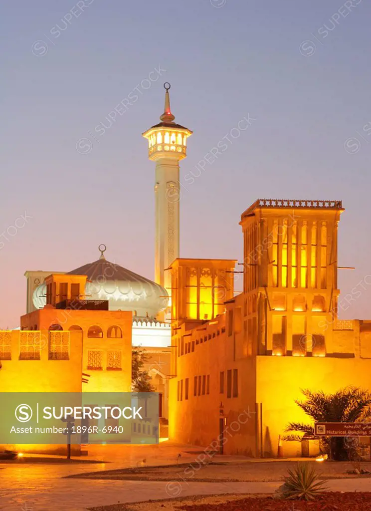 A mosque and wind towers in the historic area of Bastakiya in Dubai.