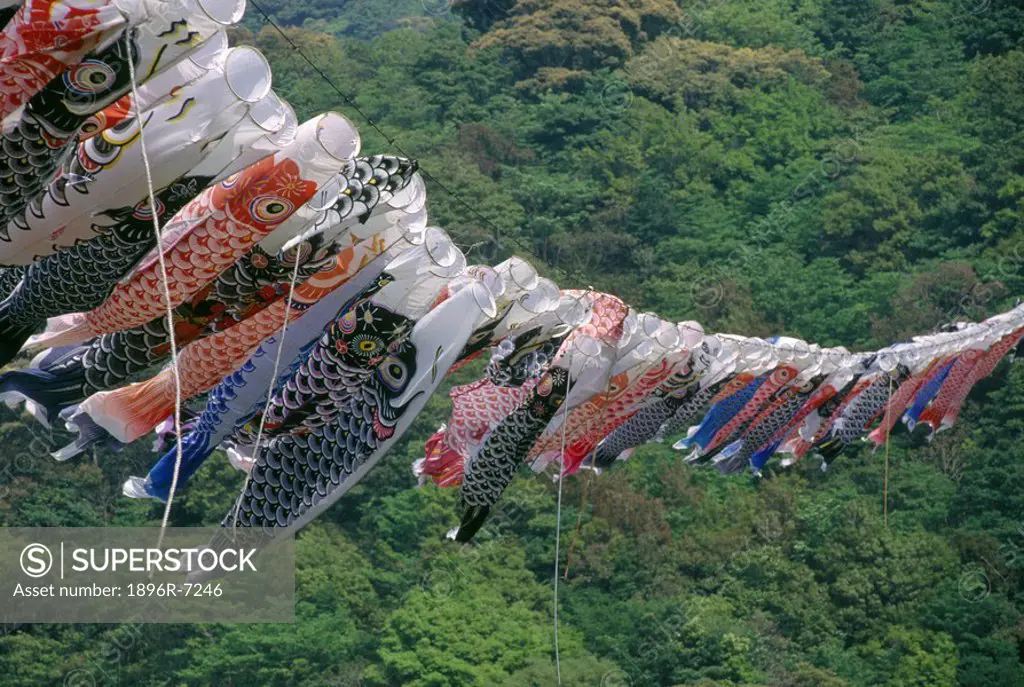 Row of Carp Streamers Hanging on a Line for Childrens Day - 5 May  Nagasaki, Kyushu Island, Japan