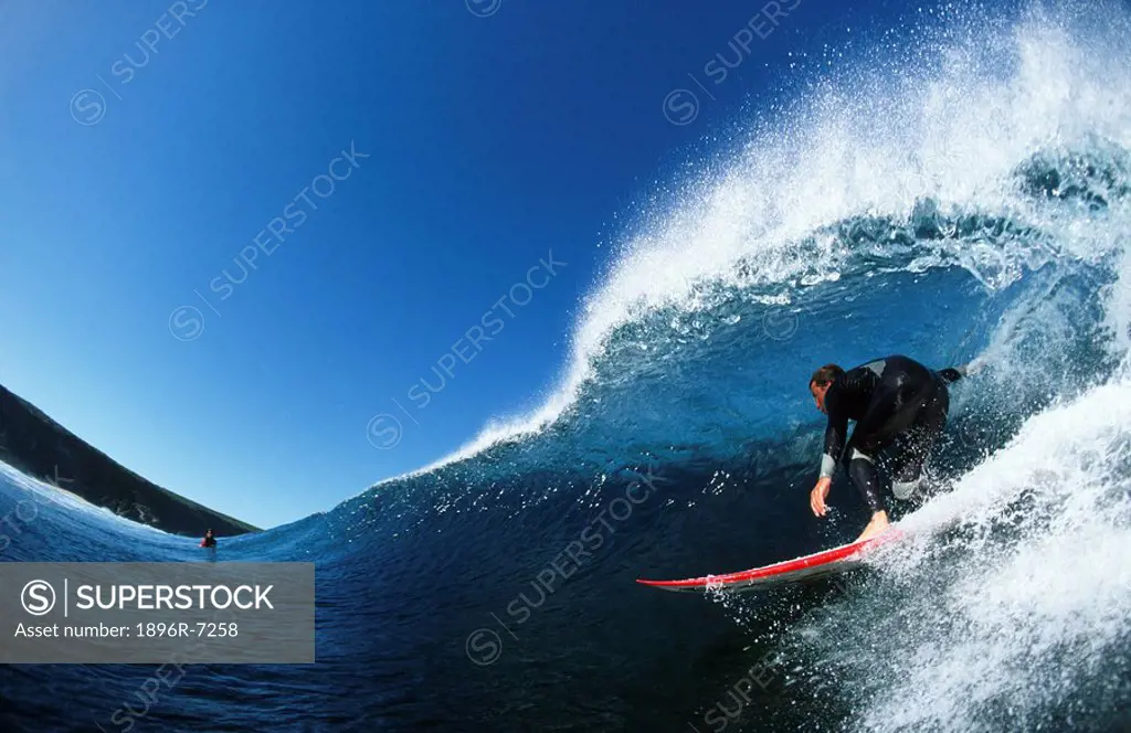 Side View of a Surfer Riding a Wave  Indijiup Beach, Western Australia