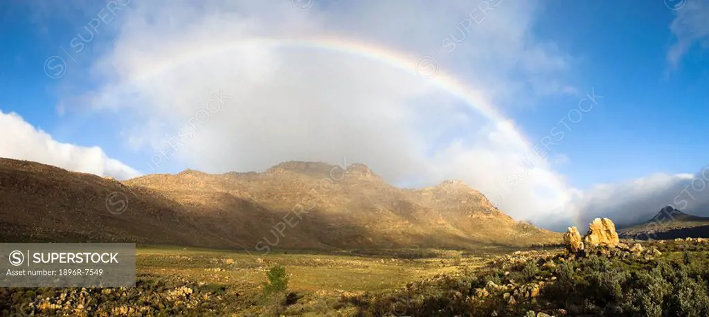 Rainbow over valley and mountains, Krom River, Cederberg Mountains, Western Cape Province, South Africa