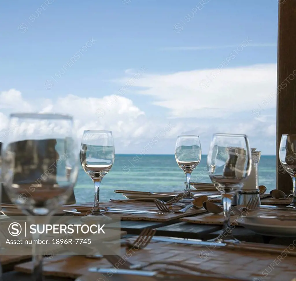 Dining area alongside tropical beach, Seychelles