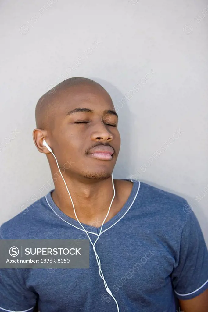 Man listening to mp3 player, KwaZulu Natal Province, South Africa