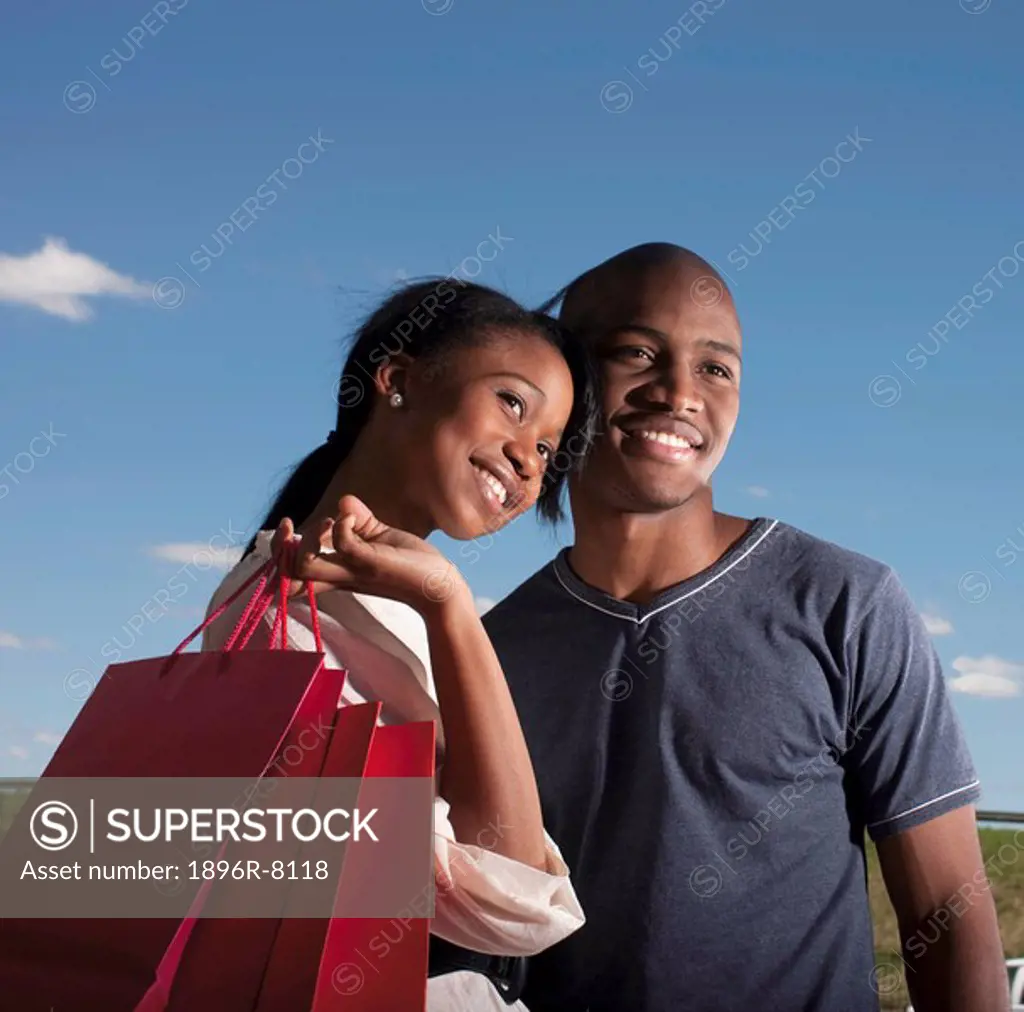 Portrait of couple after shopping, KwaZulu Natal Province, South Africa