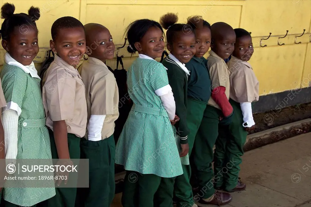 Group of schoolchildren standing in line outside their classroom, KwaZulu Natal Province, South Africa