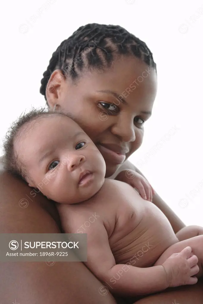 Mother holding baby girl 0_1 months, Cape Town, South Africa
