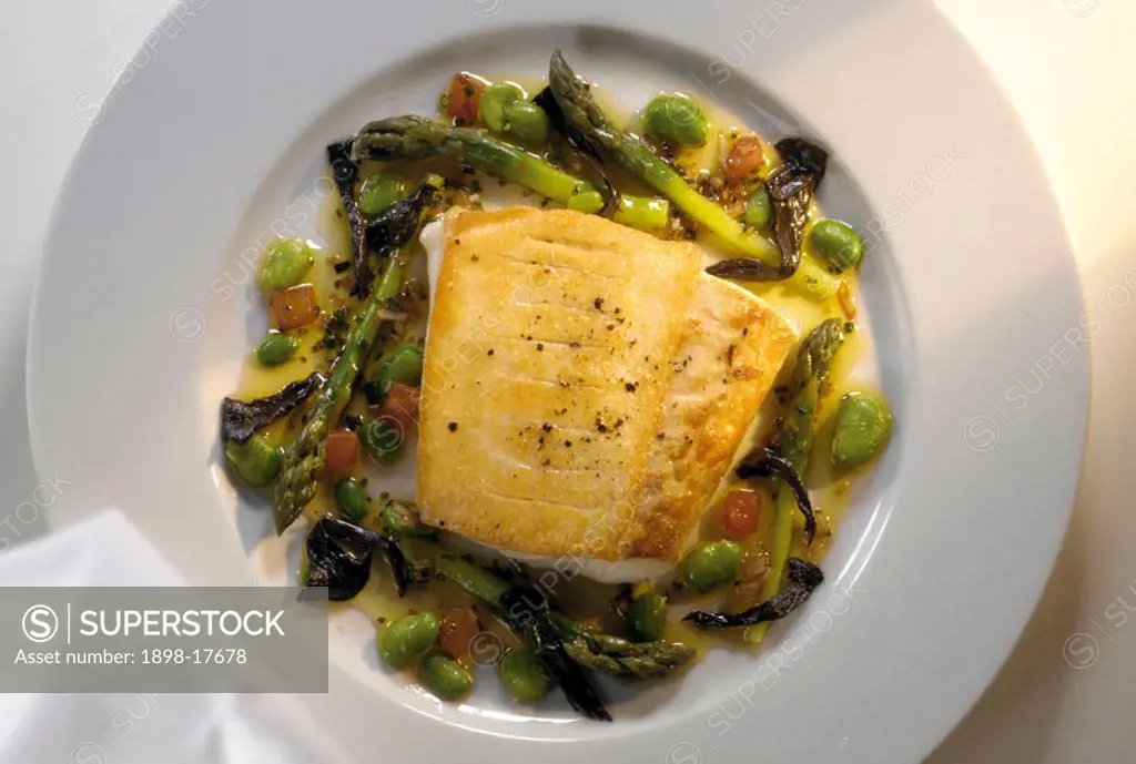 Halibut on bed of asparagus
