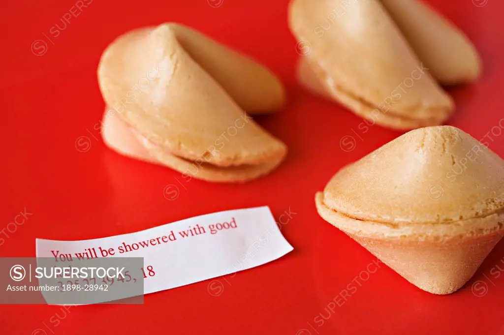 Close up of Chinese fortune cookies with motto