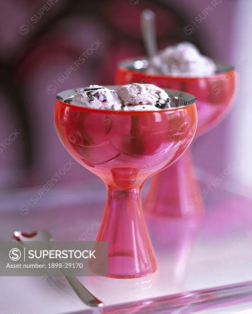 Chocolate chip ice cream, pink glass sundae dishes, food, desserts,