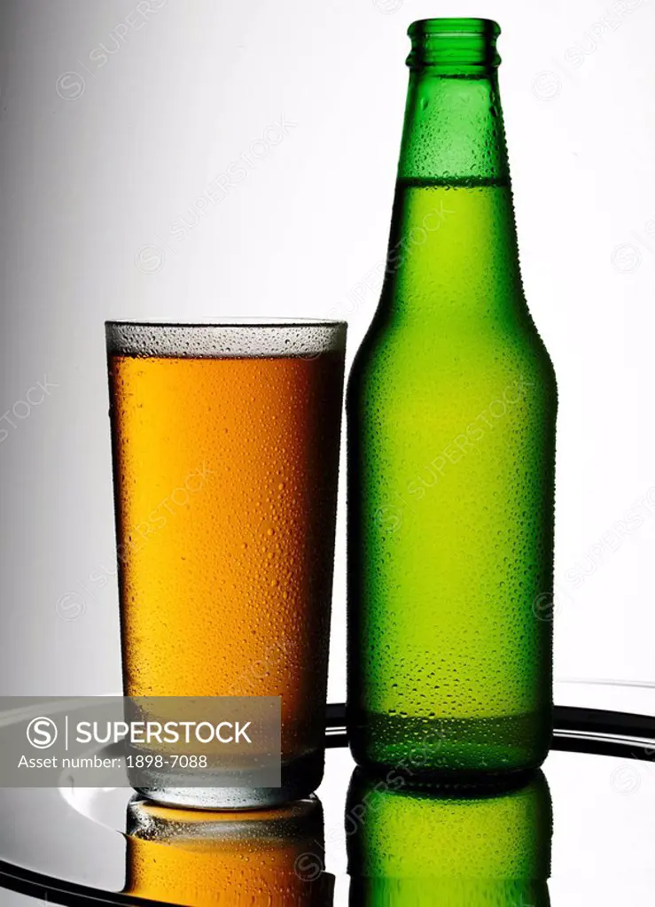 BEER BOTTLES AND GLASS