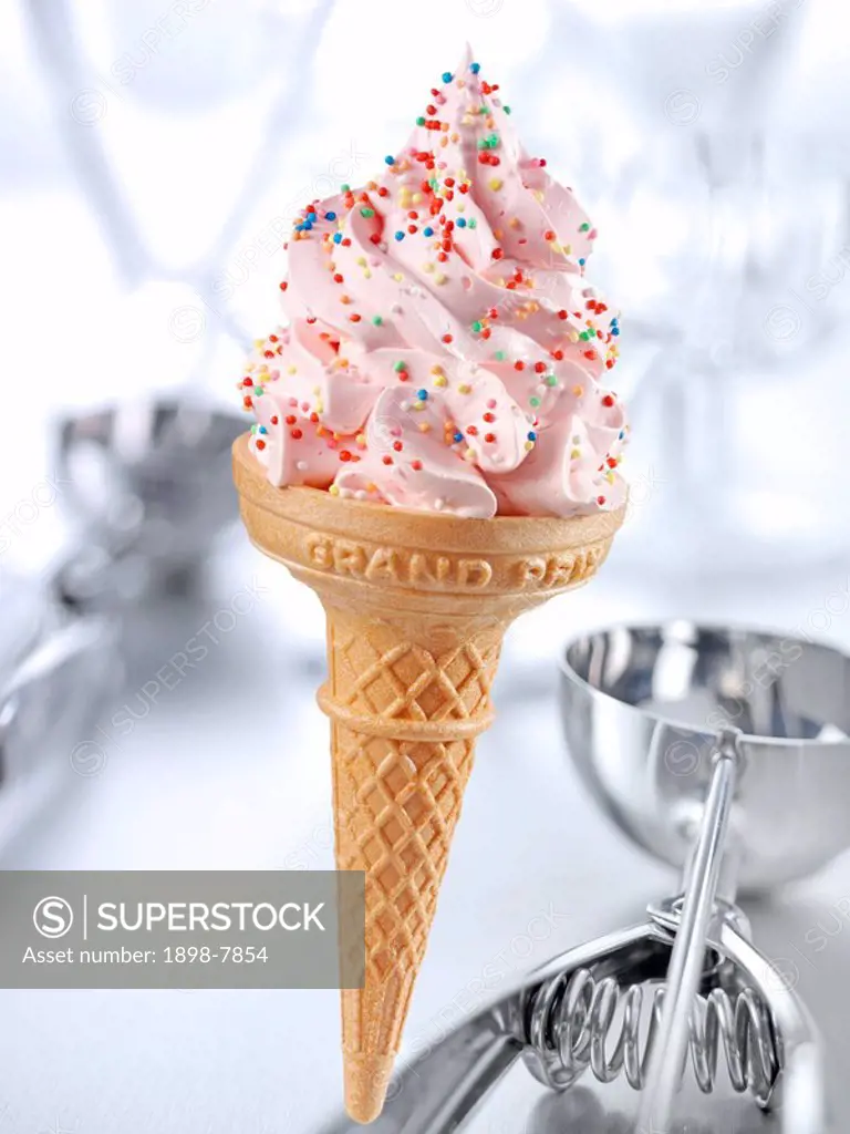 STRAWBERRY ICE CREAM CONE WITH SPRINKLES