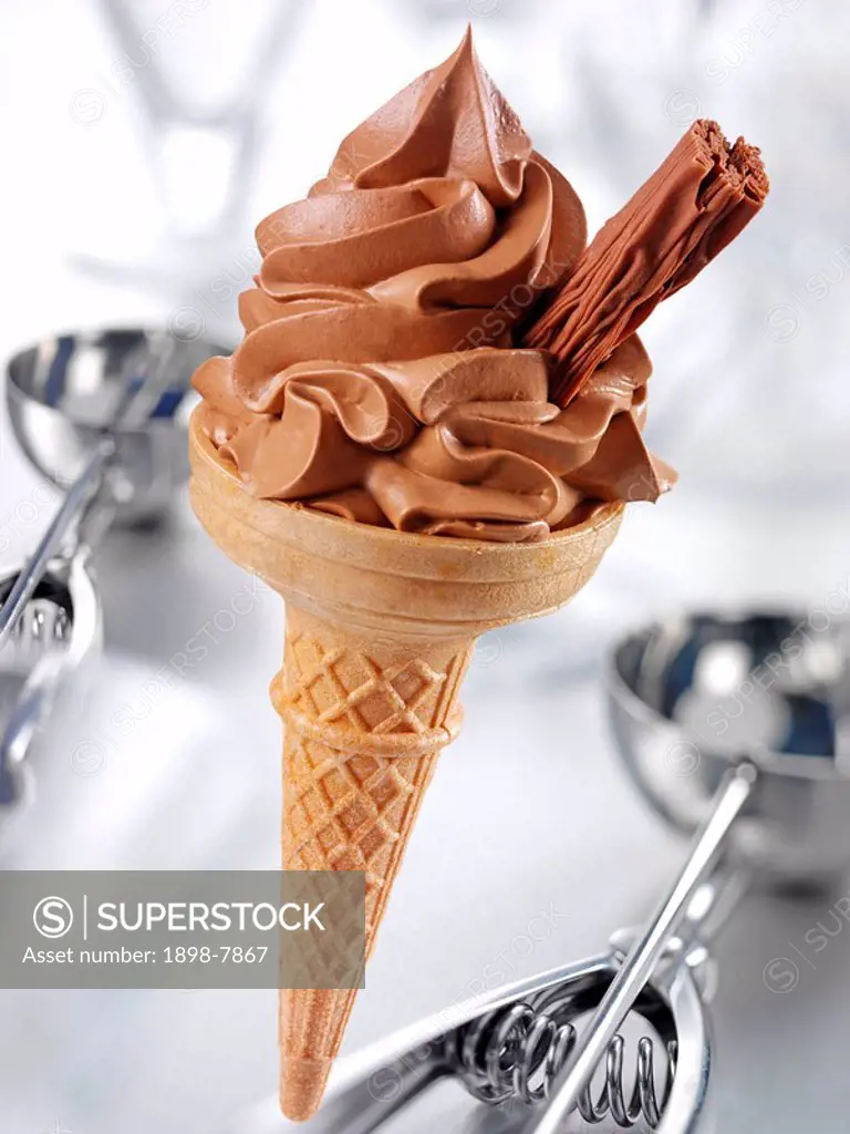CHOCOLATE ICE CREAM IN CONE WITH CHOCOLATE FLAKE