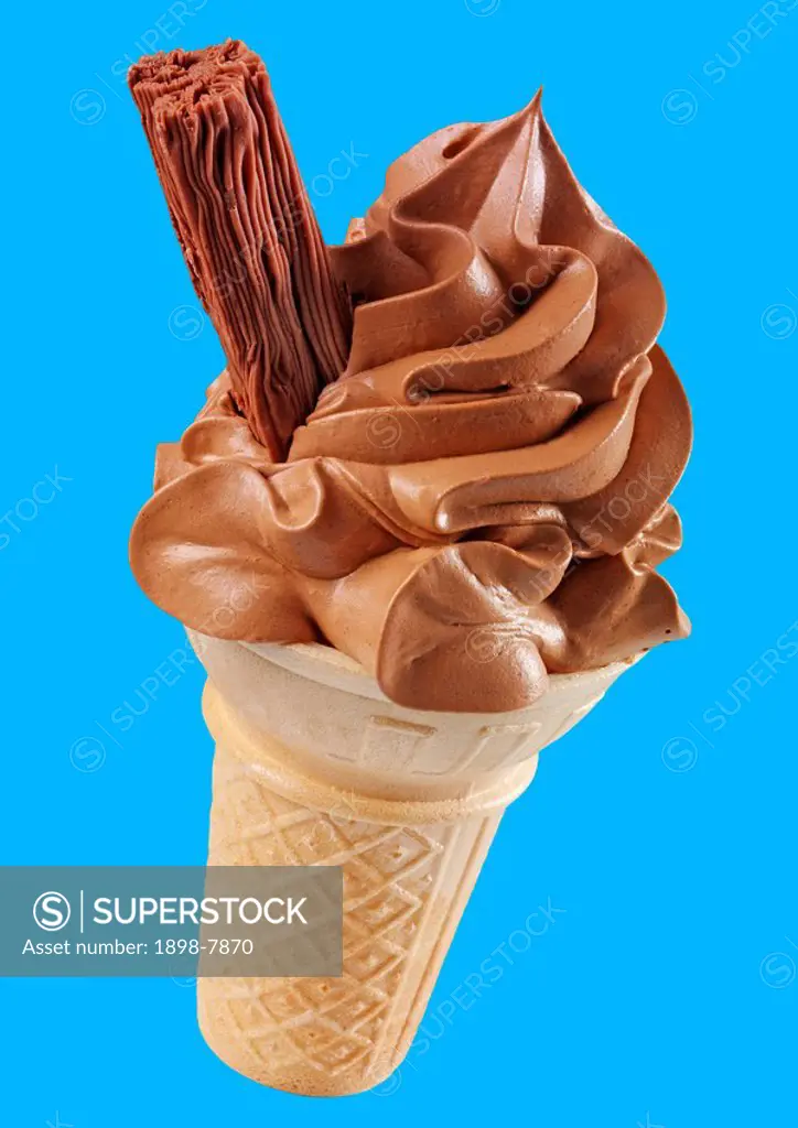 CHOCOLATE ICE CREAM IN CONE WITH CHOCOLATE FLAKE ON BLUE