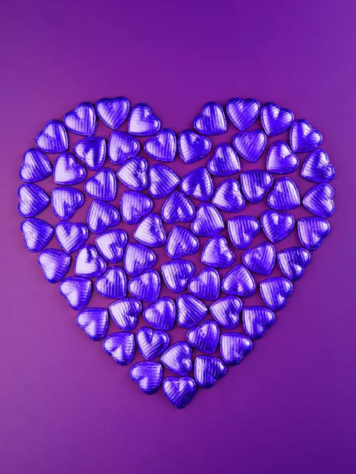 BLUE CHOCOLATE HEART ON PURPLE