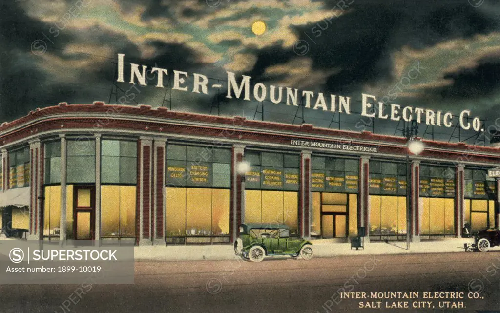 Postcard of the Inter-Mountain Electric Company. ca. 1913, Inter-Mountain Electric Company, Salt Lake City, Utah. The reverse side shows our large new store located at 4th South and Cactus Streets. Our Electrical and Automobile Accessory Departments occupy over 30,000 feet of floor space. The Automobile Service Stations include the Bosch Magneto, Rayfield Carburetors, Willard Storage Battery and Stewart-Warner products. Inter-Mountain Electric Company, 4th So. & Cactus Sts., Salt Lake City, Utah