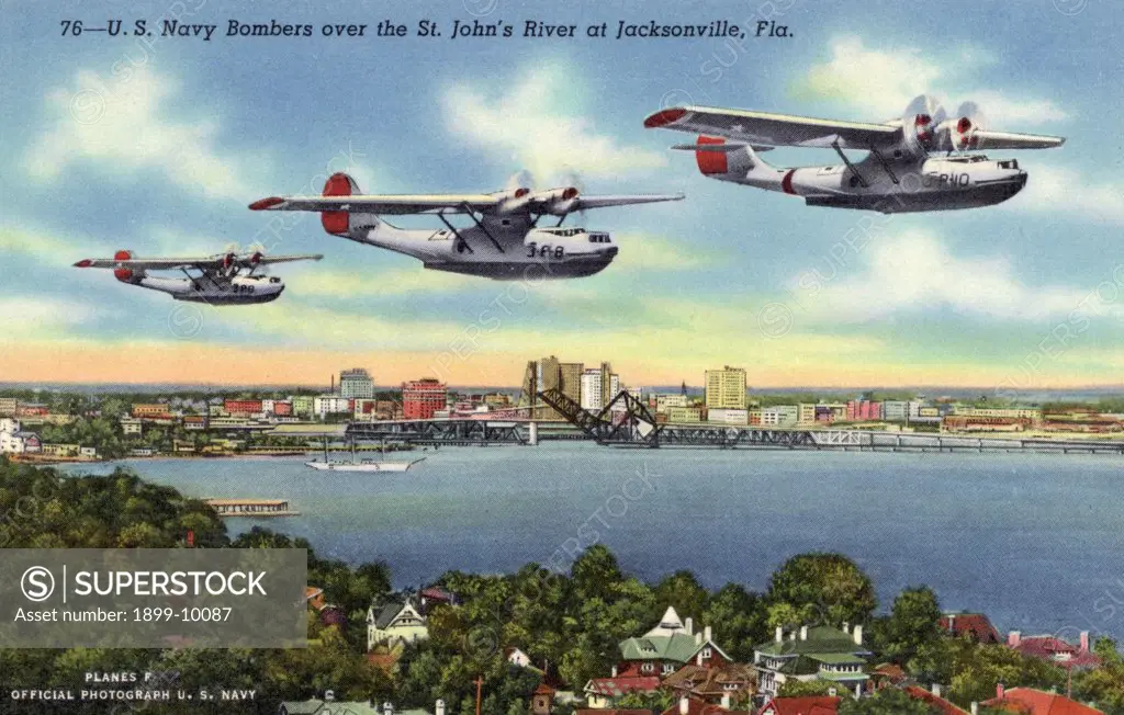 Navy Bombers Flying over the St. John's River. ca. 1940, Jacksonville, Florida, USA, 76--U.S. Navy Bombers over the St. John's River at Jacksonville, Fla. PLANES F. OFFICIAL PHOTOGRAPH U.S. NAVY. The US. Naval Air Station at Jacksonville, Fla., is one of the largest Naval Air Stations in the World. It is located on the St. John's River, 10 miles south of downtown. 