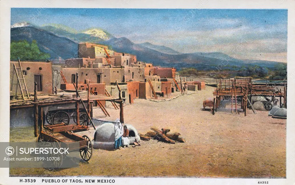 Pueblo of Taos. ca. 1934, Taos, New Mexico, USA, PUEBLO OF TAOS, NEW MEXICO The most primitive of the upper Rio Grande Indian pueblos is located between the rivers Taos and Lucero, near the Taos Mountains and the Spanish-American village of Fernandez de Taos. In its many-storied adobe communal houses live about 400 Indians, white-robed like the Arabs and very conservative. 