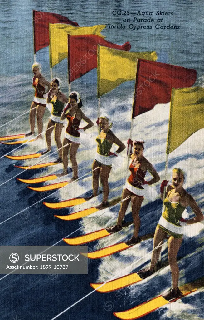 Water Skiers at Cypress Gardens. ca. 1954, Winter Haven, Florida, USA, CG.26-Pyramid of the Aqua Skiers at Florida Cypress Gardens. HUMAN PYRAMID ON WATER SKIS. It is a thrilling sight at Florida Cypress Gardens, when the five champions go speeding over the water at 30 miles per hour, to form the big pyramid, during the four daily water ski shows. 