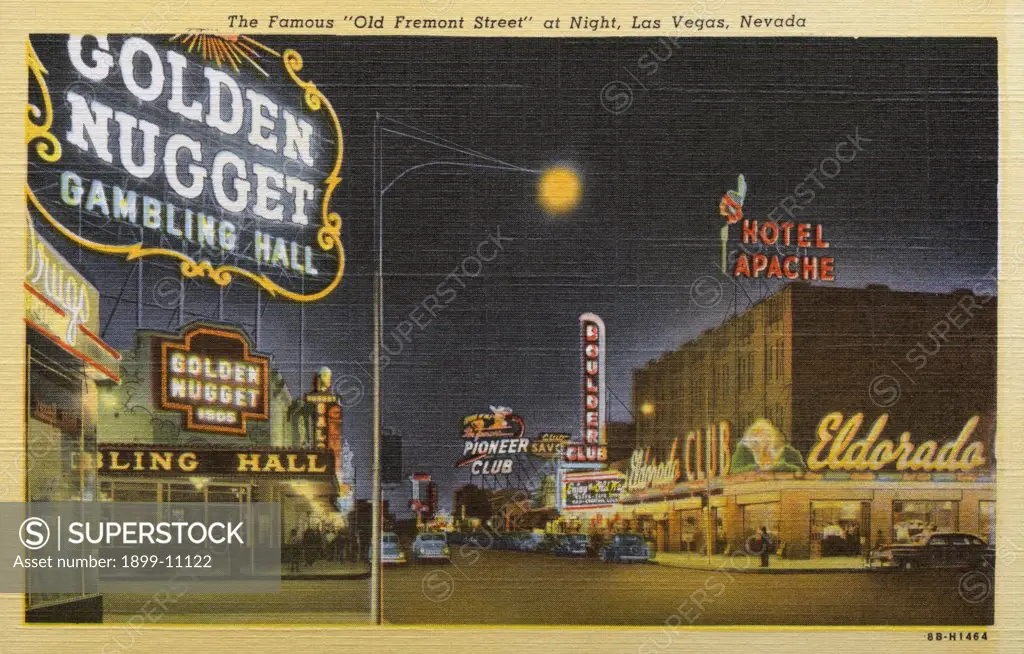 Old Fremont Street and Casinos. ca. 1948, Las Vegas, Nevada, USA, Second only to Times Square in brilliance, Las Vegas' 'Old Fremont Street' at night is the little Broadway of the West. There are no locks on the doors of its famed clubs and casinos which operate in full swing twenty-four hours a day. 