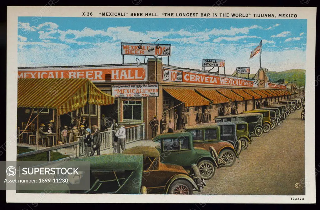 Mexicali Beer Hall. ca. 1928, Tijuana, Mexico, 'MEXICALI' BEER HALL, 'THE LONGEST BAR IN THE WORLD' TIJUANA, MEXICO. 