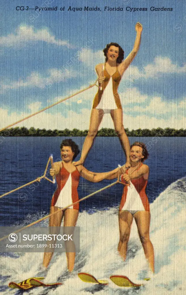 Aqua-Maids at Cypress Gardens. ca. 1949, Florida, USA, It's water skiing time in Florida and here three of the Cypress Gardens Aqua-Maids form a pyramid of beauty while skiing over the water at 30 miles per hour. 