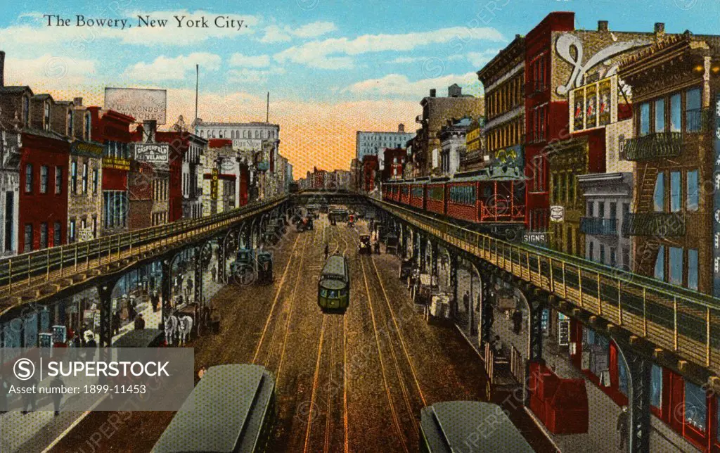 Postcard of the Bowery. ca. 1913, The Bowery, New York City. The Bowery, one of the most noted thoroughfares in the city, runs in a northeasterly direction through the most congested district of the famous East side. It practically begins at the Brooklyn Bridge under the name of Park Row and ends at Cooper Square. Was formerly a part of the old Boston Post Road. 