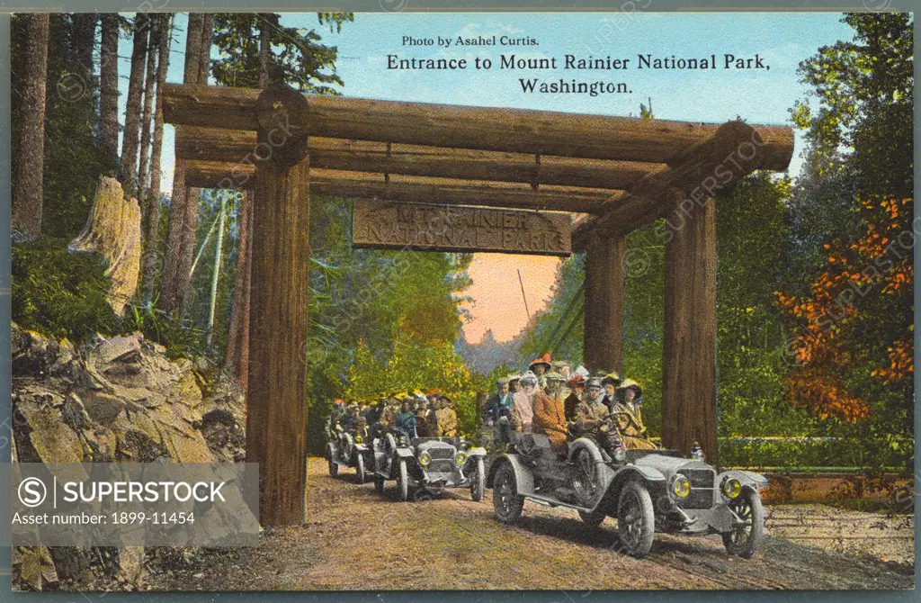 Postcard of Mount Rainier National Park Entrance. ca. 1913, Photo by Asahel Curtis. Entrance to Mount Rainier National Park, Washington. 'Mt. Rainier is located in Pierce County, Washington, about sixty miles south-east of Seattle and forty-five miles from Tacoma. It is 14,526 feet high. Rainier National Park is eighteen miles square.' 