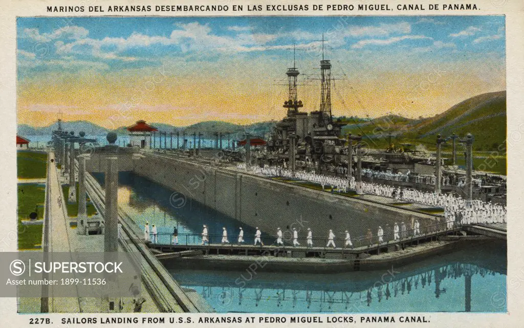 Postcard of USS Arkansas in Panama Canal. ca. 1919, MARINOS DEL ARKANSAS DESEMBARCANDO EN LAS EXCLUSAS DE PEDRO MIGUEL, CANAL DE PANAMA. 227B. SAILORS LANDING FROM U.S.S. ARKANSAS AT PEDRO MIGUEL LOCKS, PANAMA CANAL. 