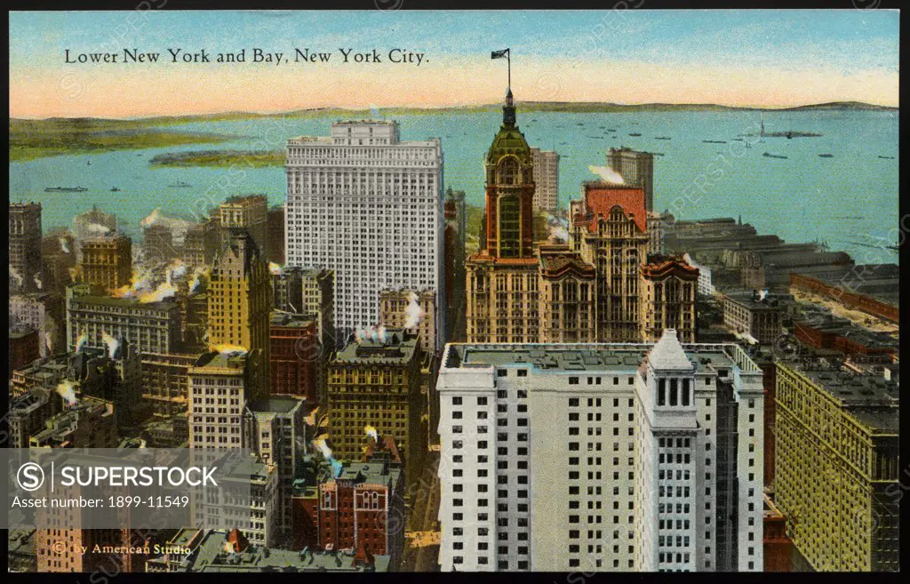 Postcard of Lower Manhattan and Bay. ca. 1919, Lower New York and Bay, New York City. LOWER MANHATTAN AND BAY FROM WOOLWORTH BUILDING, NEW YORK CITY. In this comparatively small and congested district are located the largest and most noted office Buildings in the world. New York Bay is the southern boundary, and the Hudson and East Rivers form the eastern and western boundaries. 