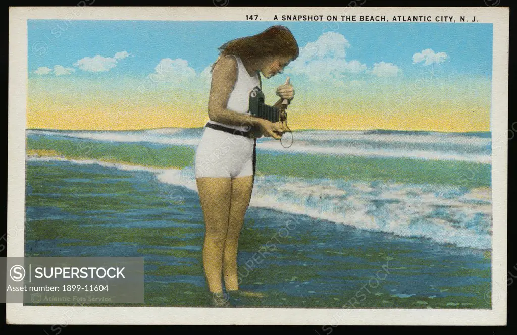 Postcard of a Woman Photographing the Ocean. ca. 1921, 147 A Snapshot on the Beach, Atlantic City, N.J. Published by Saltzburg's Merchandise Co., Atlantic City, N.J. 