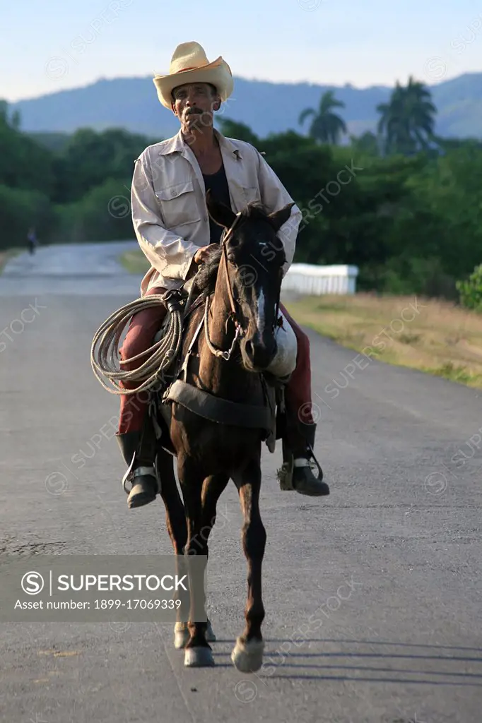 A man riding his horse. Trinidad. Cuba island. West Indies. Central America