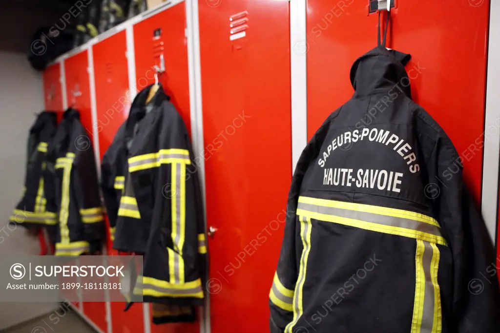Fire department.   Fireman coats wait for the next call. Locker room.  French Sapeurs Pompiers. France. 