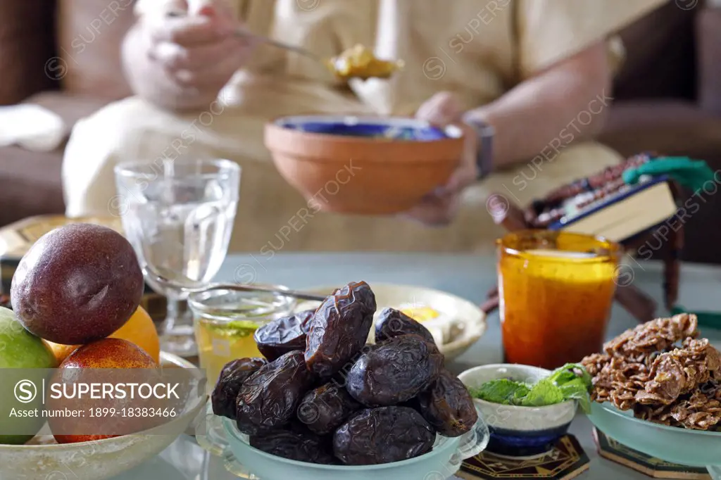 Traditional meal for iftar in time of Ramadan after the fast has been broken. Muslim eating. France. (Photo by: Fred de Noyelle/Godong/UIG)