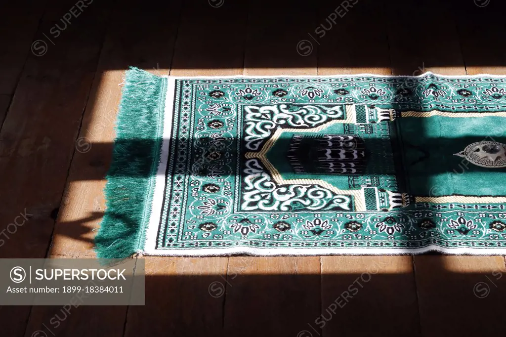 Muslim prayer mat at home. France. (Photo by: Pascal Deloche/Godong/UIG)