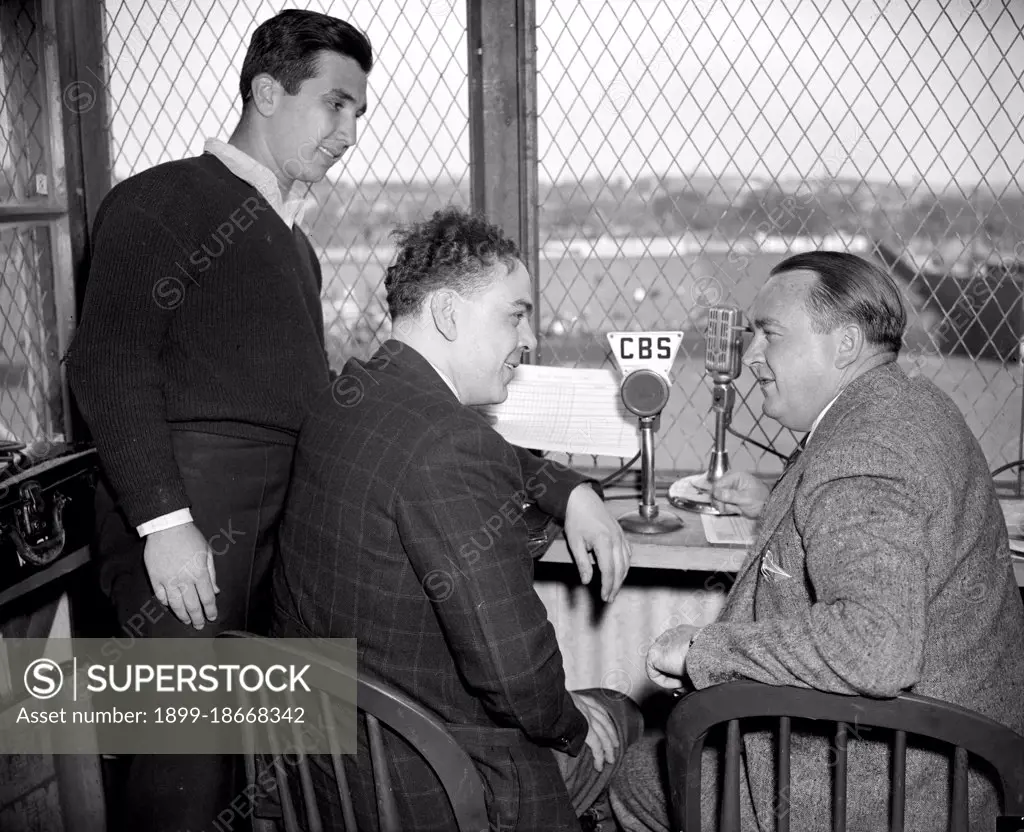 Columbia Broadcasting System. Arch McDonald, Warren Sweeney, and helpers at ball park, 4/19/38.