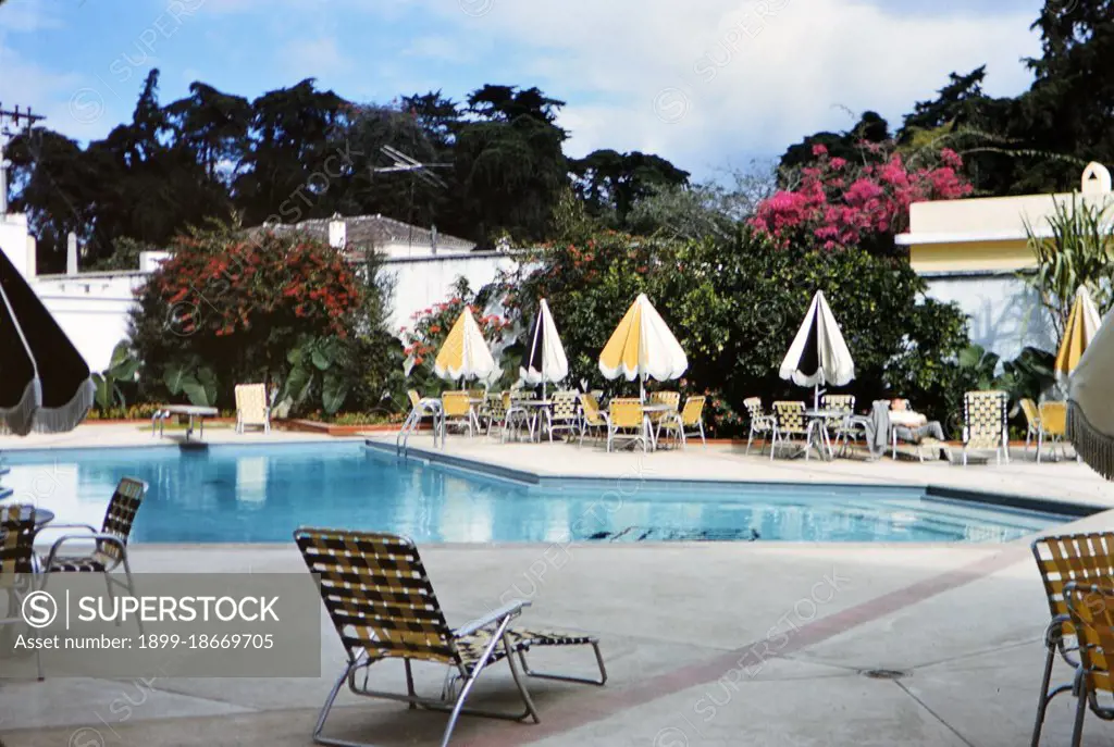 1962 Guatemala - Swimming pool and patio furniture at a luxury hotel in Guatemala, possibly the Biltmore circa 1962.