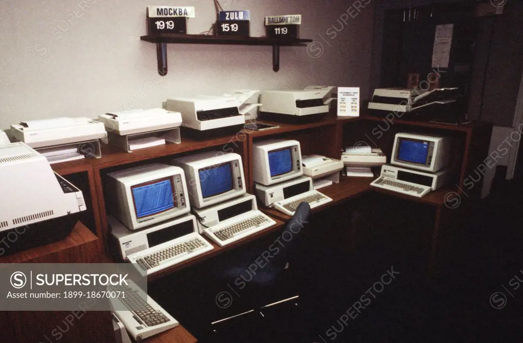 A view of computer stations, printers and facsimile machines that are part of American terminus of the Washington-Moscow Direct Communications Link. .