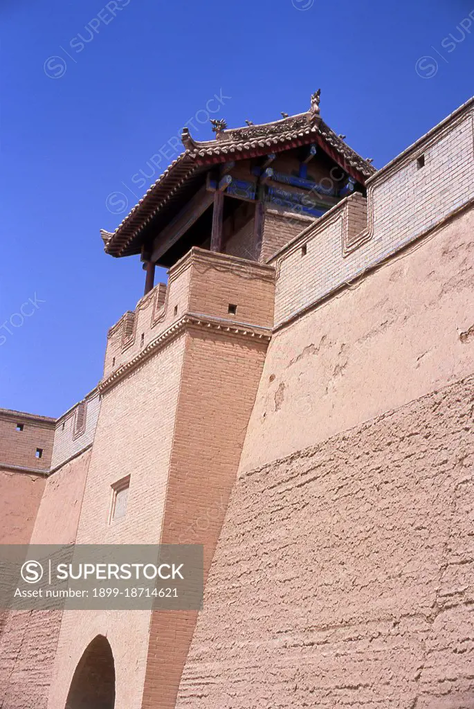 Jiayuguan, the First and Greatest Pass under Heaven’, was completed in 1372 on the orders of Zhu Yuanzhang, the first Ming Emperor (1368-98), to mark the end of the Ming Great Wall. It was also the very limits of Chinese civilisation, and the beginnings of the outer barbarian’ lands. For centuries the fort was not just of strategic importance to Han Chinese, but of cultural significance as well. This was the last civilised place before the outer darkness, those proceeding beyond, whether disgraced officials or criminals, faced a life of exile among nomadic strangers. Jiayuguan or Jiayu Pass (literally 'Excellent Valley Pass') is the first pass at the west end of the Great Wall of China, near the city of Jiayuguan in Gansu province.