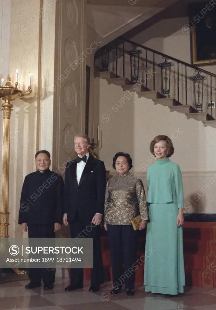 Deng Xiaoping Jimmy Carter Madame Zhuo Lin and Rosalynn Carter pause for a formal pose during the state dinner for the Vice Premier of China. circa  29 January 1979.