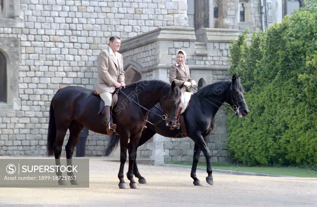  President Reagan and Queen Elizabeth II horseback riding. 