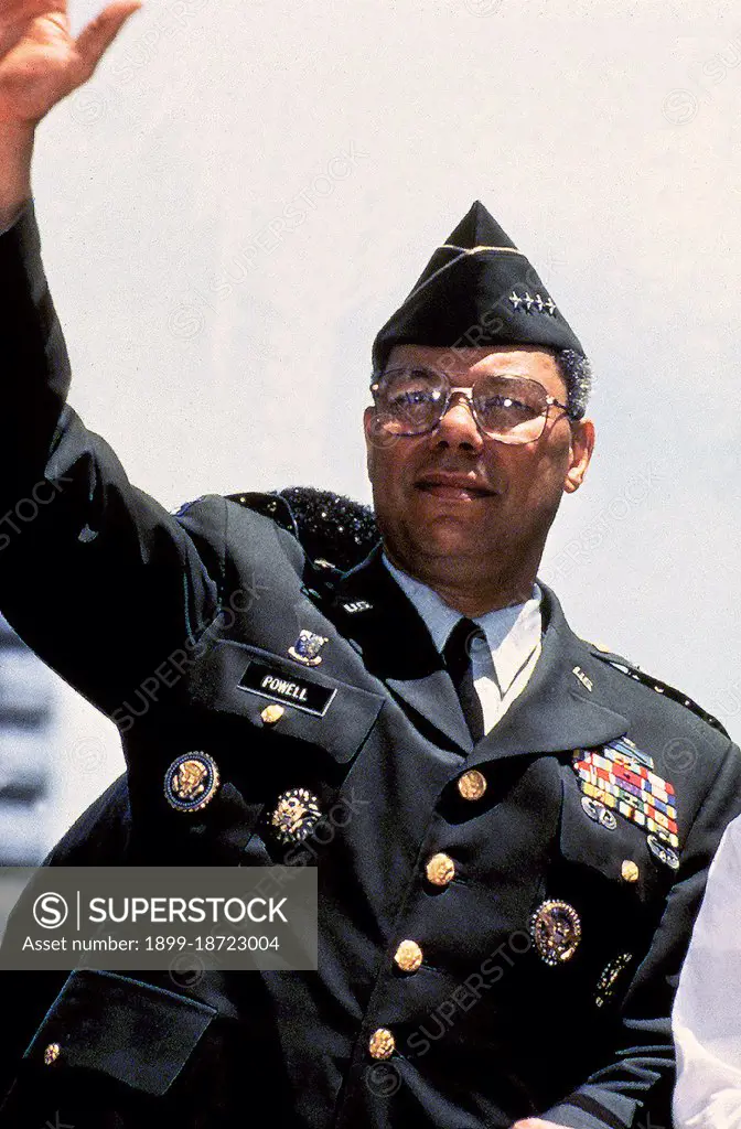US Army (USA) General Colin Powell, Chairman, Joint Chiefs of Staff, waves from his motorcade during the Persian Gulf War, Welcome Home Parade, held in New York City, New York (NY). 