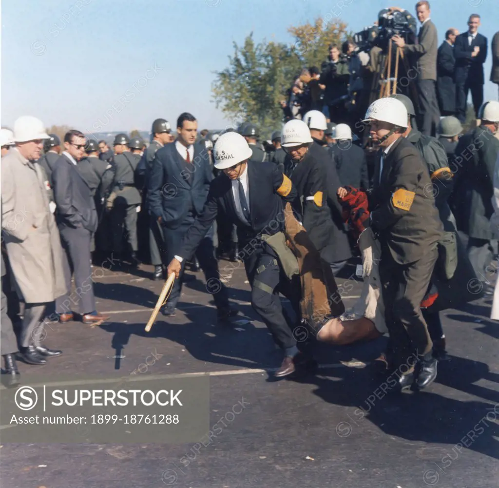 US Marshals remove Vietnam War Protesters from the Pentagon during massive anti-war demonstration, 10/21/1967, Photo by US Army Signal Corps, GG Vintage Images