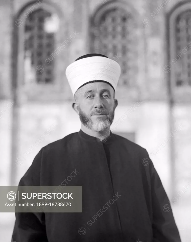 Haj Mohammed Effendi Amin el-Husseini (Muhammad Amin al-Husayni; born between 1895 and 1897; died July 4, 1974) was a Palestinian Arab nationalist and Muslim leader in the Mandatory Palestine. Al-Husseini was an Arab nationalist and following the end of the First World War positioned himself in Damascus, as a supporter of the Arab Kingdom of Syria. However, following the fiasco of the Franco-Syrian War, his positions on pan-Arabism shifted to a form of local nationalism for the Arabs of Palestine and he moved back to Jerusalem. From 1921 to 1937 al-Husseini was the Grand Mufti of Jerusalem, using the position to promote Islam and rally Arab nationalism against Zionism. During the 1948 Palestine War, Husseini represented the Arab Higher Committee and opposed both the 1947 UN Partition Plan and King Abdullah's entente with Zionists to annex the Arab part of British Mandatory Palestine to Jordan. In September 1948, he participated in the establishment of an All-Palestine Government. Seate