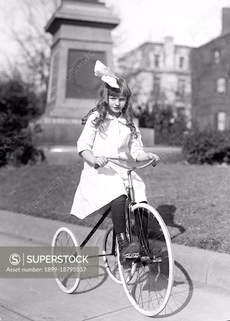 Helen Marye, daughter of ambassador to Russia George Marye, riding a tricycle  ca. 1913-1917. 