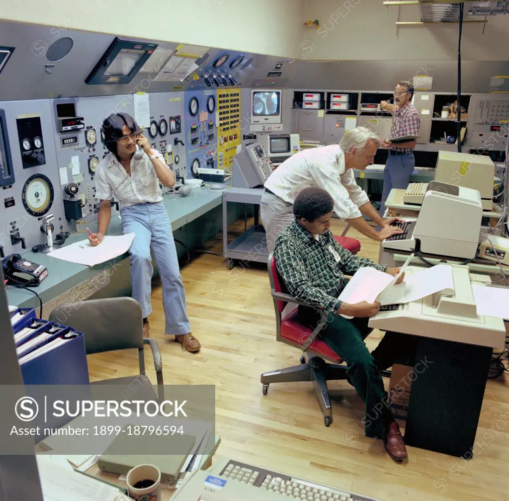 40x80ft Wind Tunnel control room with technicians and engineers - Ames Research Center ca. 1979. 