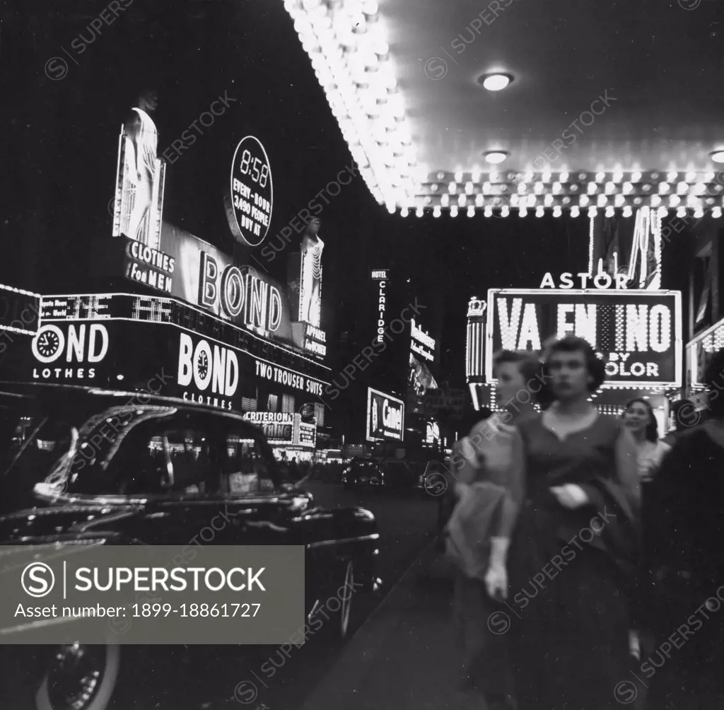 Night view of New York's Broadway, lighted with electric advertising displays. May, 1951. State Department photo by Riordan/
