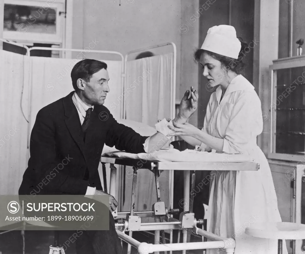 Public Health Service nurse treating patient ca.  1918.